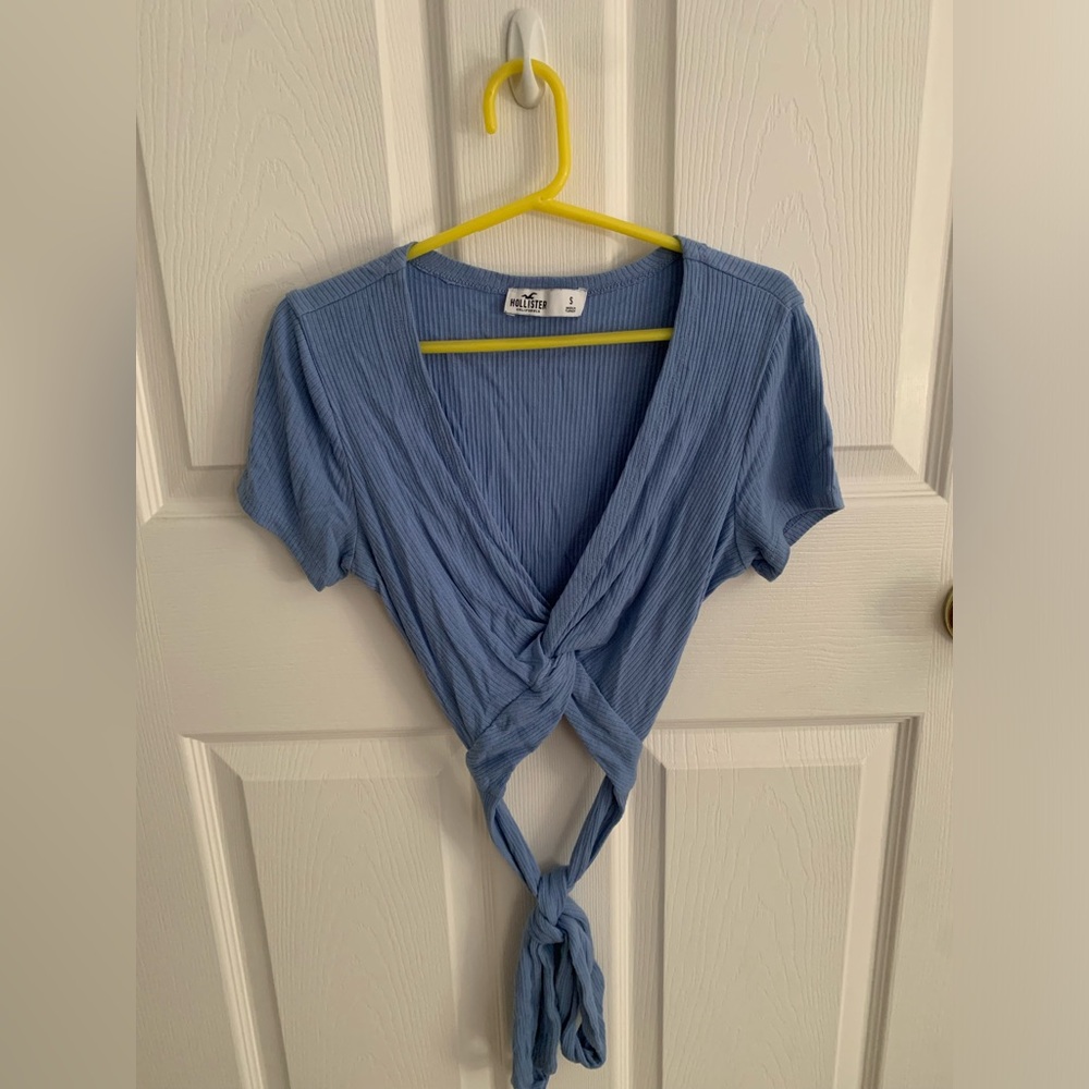 Size small, light blue wrap shirt from hollister.